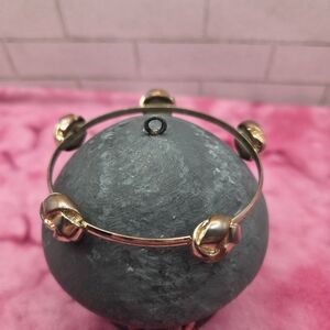 864. Vintage Gold Tone Love knot Bangle Bracelet